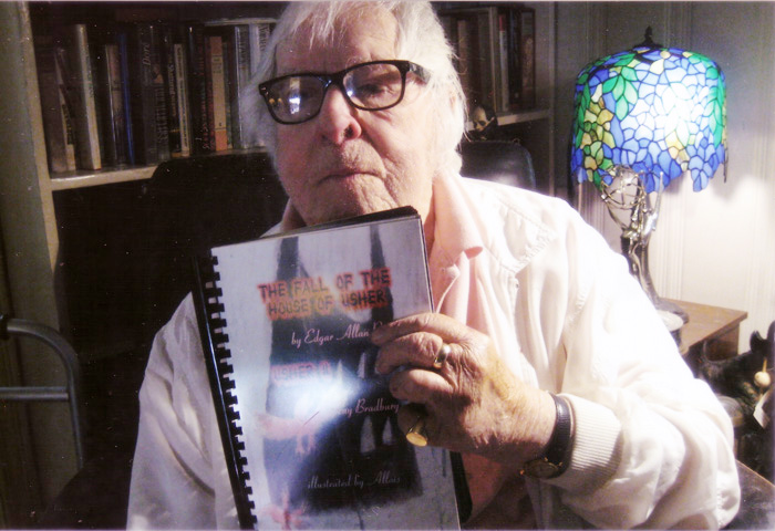 Ray Bradbury holding THE FALL OF THE HOUSE OF USHER / USHER II